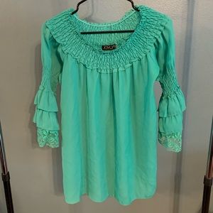 Green off the shoulder blouse